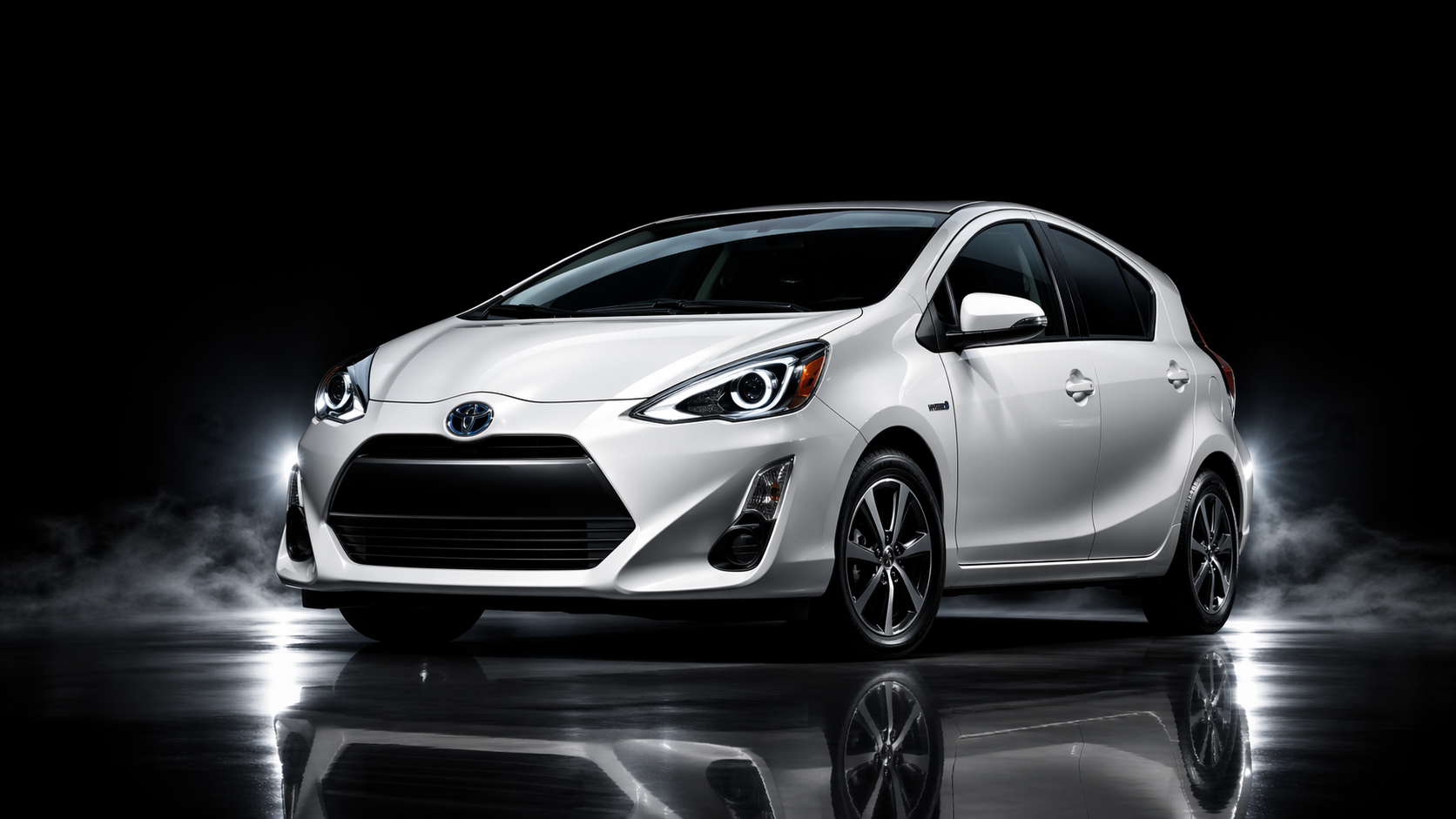 Toyota Aqua compact hybrid hatchback rental Katuneriya Sri Lanka - Dananjaya Rent a Car fuel efficient